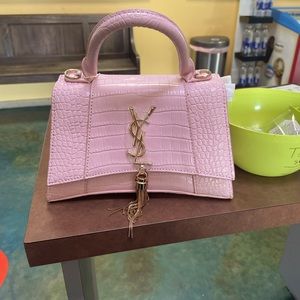 Brand New saint lauren bag, wrapping is still inside of the bag.